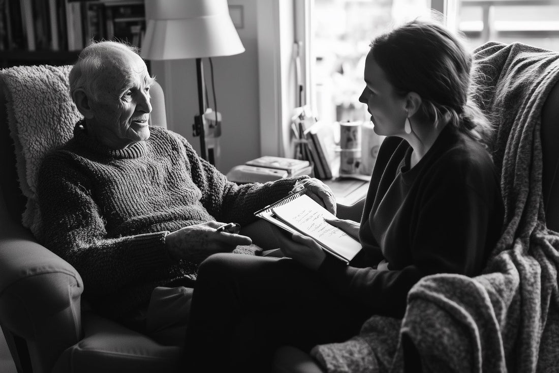 Moment intime d'échange entre générations. Une jeune femme écoute et note les souvenirs d'un aîné, créant un lien précieux.